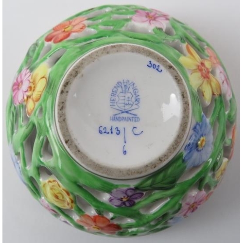 61 - Three porcelain boxes and a Herend porcelain reticulated potpourri pot with cover, 20th century. Com... 