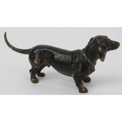 99 - An Austrian cold painted bronze dachshund, late 19th/early 20th century. Struck ‘Austria’ mark benea... 