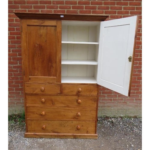 705 - A Victorian cherry wood linen press, the moulded cornice above twin panelled doors opening onto a cr... 