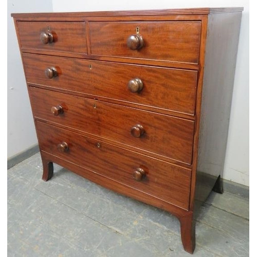 708 - A George III mahogany straight front chest, the crossbanded top with reeded edge, above two short an... 