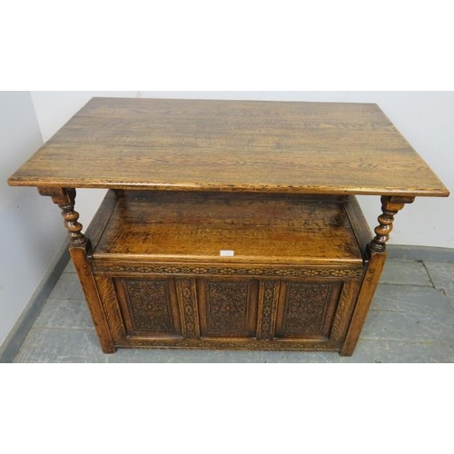 713 - A good quality medium oak monk’s bench in the 17th century taste, having a sliding backrest joined w... 