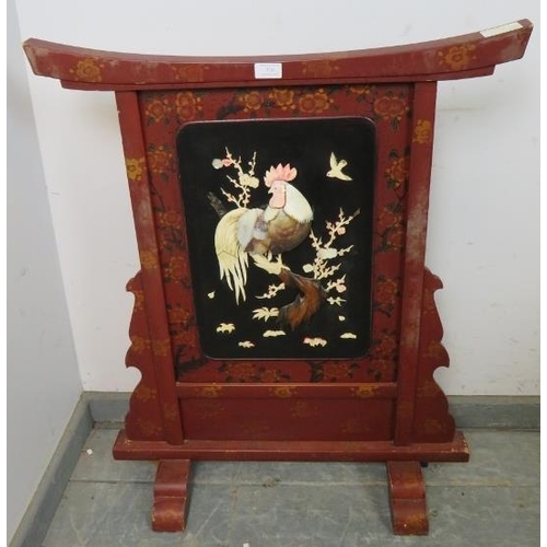 718 - An antique Japanese Shibayama red lacquer fire screen, having applied bone, mother of pearl, abalone... 