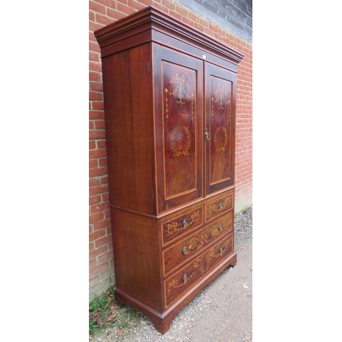 720 - A 19th century mahogany Sheraton Revival linen press, the dentil cornice above marquetry inlaid door... 