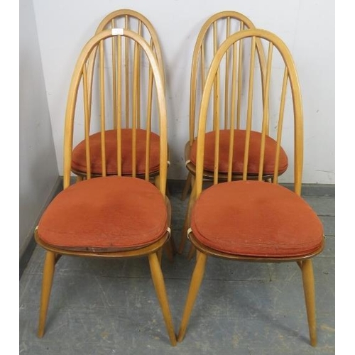 723 - A set of four mid-century blonde elm and beech Windsor Quaker dining chairs by Ercol (model 365) on ... 