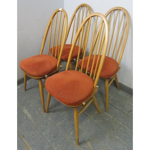 723 - A set of four mid-century blonde elm and beech Windsor Quaker dining chairs by Ercol (model 365) on ... 