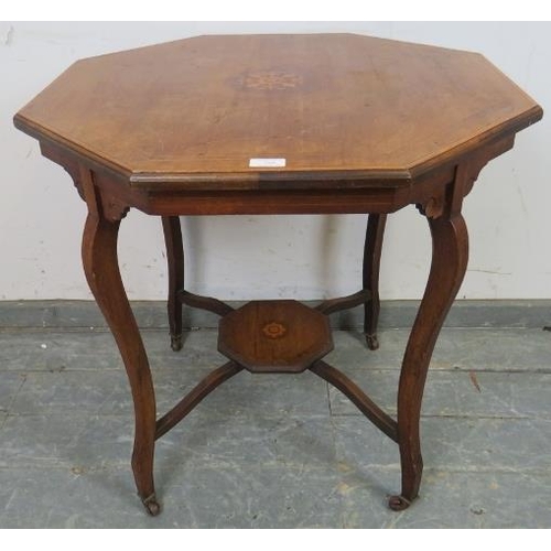 732 - An Edwardian mahogany octagonal table, having marquetry inlay and strung with boxwood, on cabriole s... 