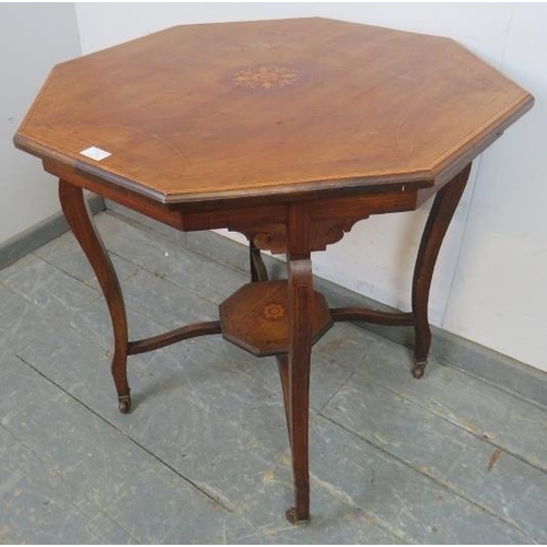 732 - An Edwardian mahogany octagonal table, having marquetry inlay and strung with boxwood, on cabriole s... 