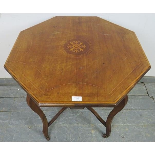 732 - An Edwardian mahogany octagonal table, having marquetry inlay and strung with boxwood, on cabriole s... 