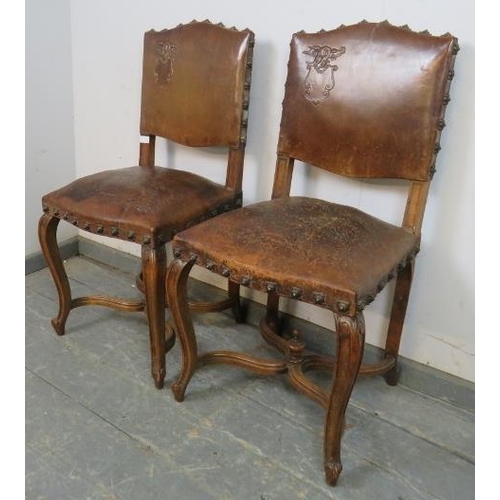 742 - A pair of 19th century walnut Continental side chairs, upholstered in tobacco brown embossed leather... 