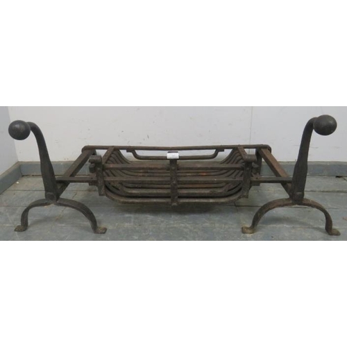 747 - A heavy, well-made Gothic style wrought iron fire basket and fire dogs with ball finials, on splayed... 