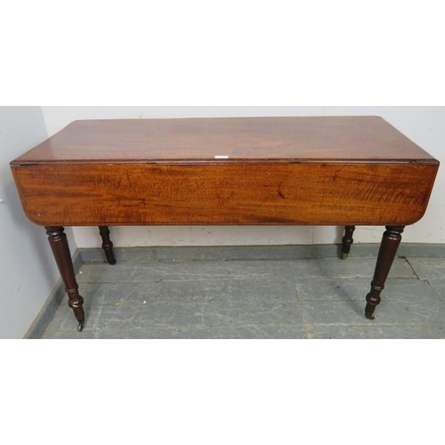 757 - An early 19th century mahogany Pembroke table of exceptionally long proportions, having single drawe... 