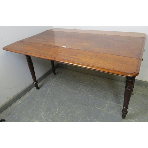 757 - An early 19th century mahogany Pembroke table of exceptionally long proportions, having single drawe... 