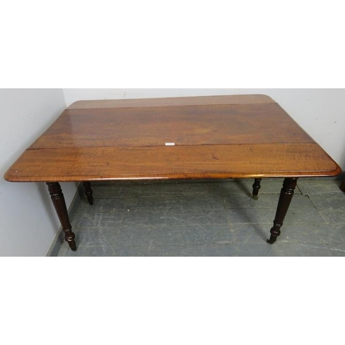 757 - An early 19th century mahogany Pembroke table of exceptionally long proportions, having single drawe... 