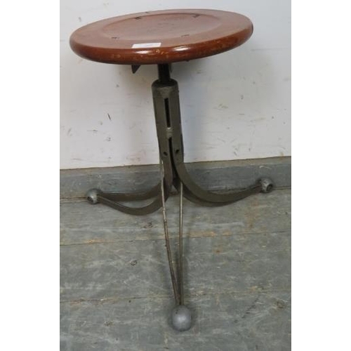 760 - A vintage Rubery Owen ‘Blade’ machinist’s stool, the height-adjustable dished walnut top on a six-pa... 