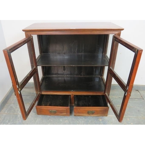 762 - A vintage Chinese elm glazed display cabinet, having one loose shelf, above two short drawers with c... 