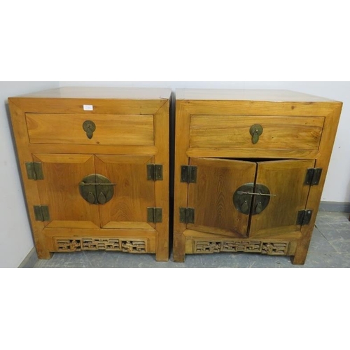 764 - A pair of vintage light elm Chinese side cabinets, each with one long drawer above double doors with... 