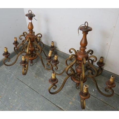 768 - A pair of vintage Continental fruitwood and gilt metal six branch chandeliers. 
H70cm Diameter 67cm ... 