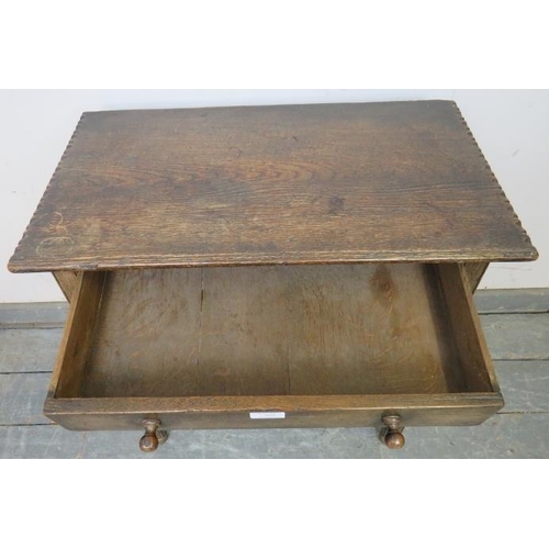 769 - A vintage oak side table in the 18th century taste, having one long drawer with turned wooden handle... 