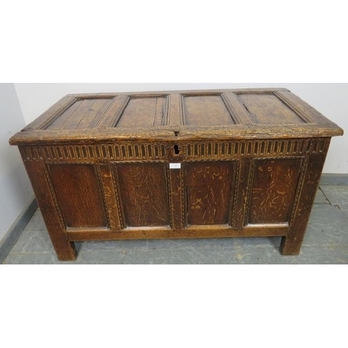 785 - A late 17th/early 18th century oak panelled coffer of good colour, with chip carved frieze and panel... 