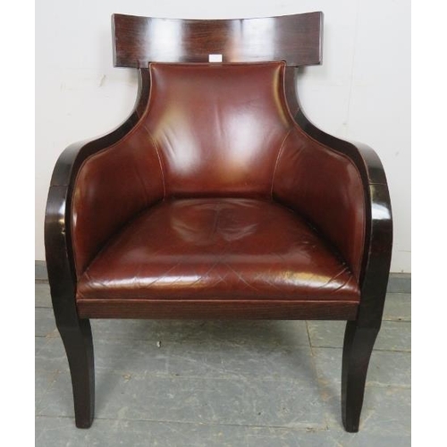 787 - A contemporary fruitwood armchair in the French Empire style, upholstered in supple tobacco brown le... 