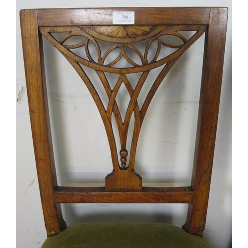 788 - A pair of Georgian fruitwood side chairs, the pierced backs with batwing inlay, on tapered square su... 