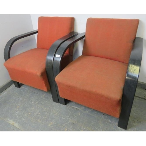 804 - A pair of Art Deco Period open-sided club armchairs, the curved armrests flowing into stile supports... 