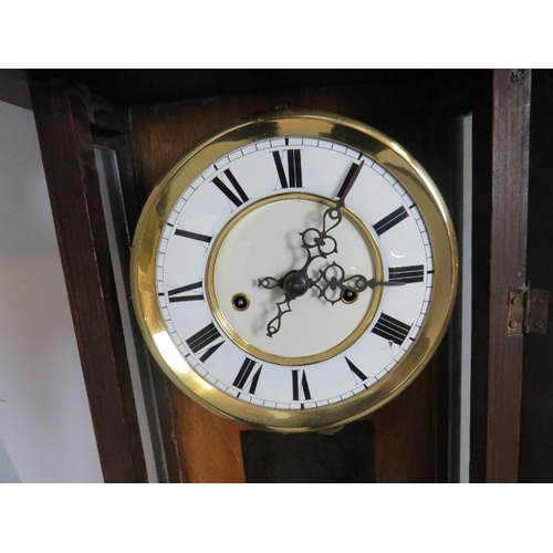 819 - A 19th Century glazed walnut cased Vienna - type wall clock, the case of classical architectural for... 