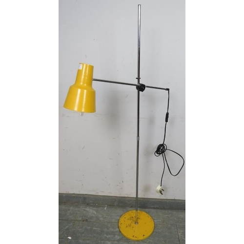 821 - A vintage mid-century floor standing lamp, having yellow enamel shade, on a plinth base. C1970.
H130... 