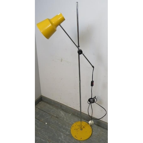 821 - A vintage mid-century floor standing lamp, having yellow enamel shade, on a plinth base. C1970.
H130... 