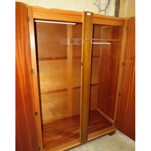 826 - An Art Deco Period burr walnut double wardrobe by Lebus, having fancy cast metal handles, the twin d... 