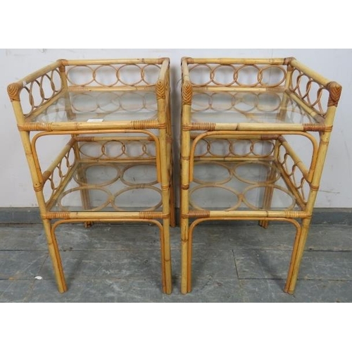 833 - A pair of vintage bamboo galleried two-tier side tables, having loose glass inset shelves. 
H69cm W3... 