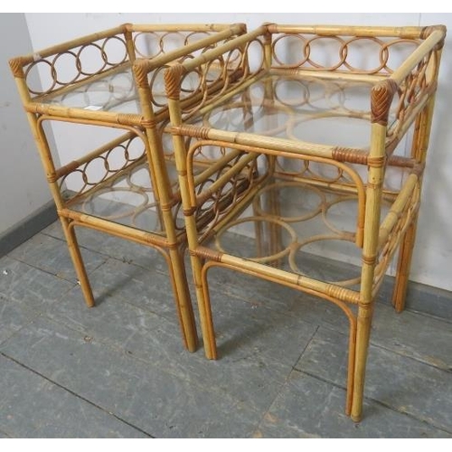 833 - A pair of vintage bamboo galleried two-tier side tables, having loose glass inset shelves. 
H69cm W3... 