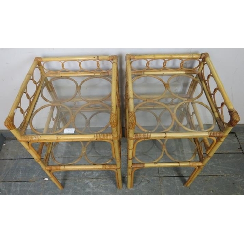 833 - A pair of vintage bamboo galleried two-tier side tables, having loose glass inset shelves. 
H69cm W3... 