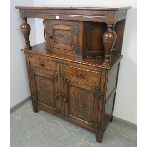 838 - A good solid early 20th century court cupboard in the late 17th century style, good carved panels, n... 