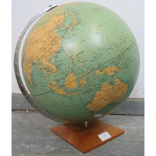 843 - A vintage mid-century Phillips Challenge 13.5” globe, on a metal stand with chamfered light oak plin... 