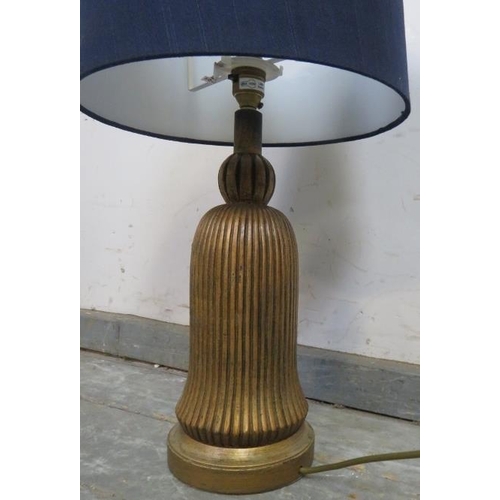 849 - A good quality period style giltwood table lamp, on a bell-shaped reeded column with plinth base. Wi... 