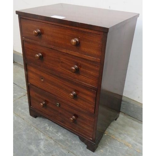 851 - A well-made 19th century mahogany chest of diminutive proportions, housing four oak-lined long drawe... 