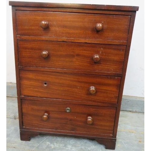 851 - A well-made 19th century mahogany chest of diminutive proportions, housing four oak-lined long drawe... 