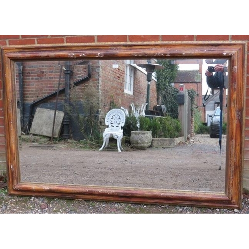 857 - A very large contemporary rectangular bevelled wall mirror within a moulded frame with a distressed ... 