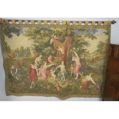 858 - A large vintage machined wall-hanging tapestry depicting classical scenes, on a fruitwood pole with ... 