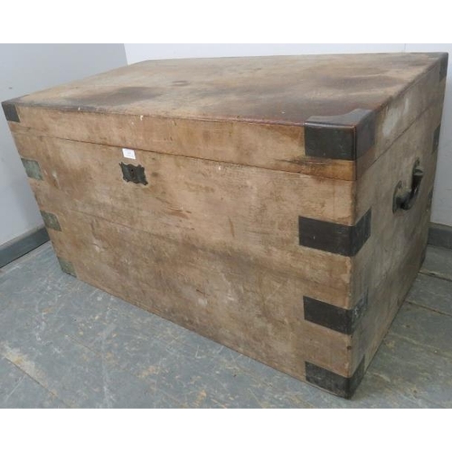 859 - A large 19th century brass bound oak chest, having carry handles to either side, the fitted interior... 