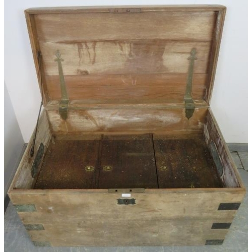 859 - A large 19th century brass bound oak chest, having carry handles to either side, the fitted interior... 