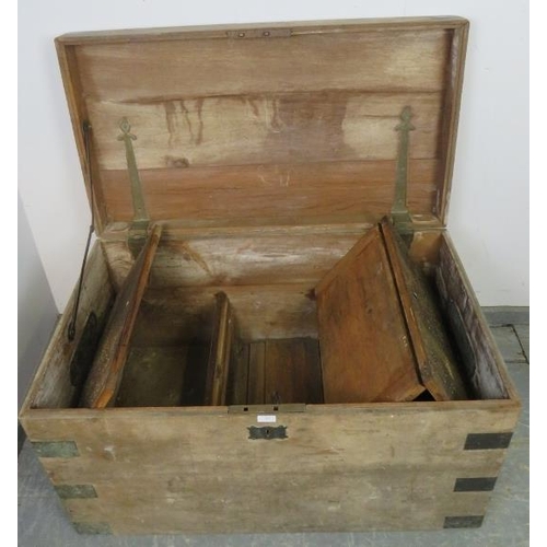 859 - A large 19th century brass bound oak chest, having carry handles to either side, the fitted interior... 