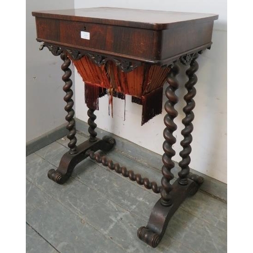 862 - A Victorian rosewood worktable, the top opening to reveal a fitted interior housing an array of lidd... 