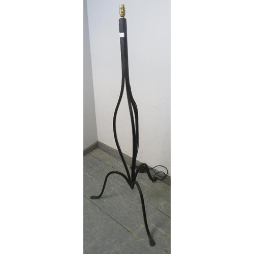 874 - An ornate wrought iron standard lamp, no shade.
H144cm (approx). Sold electronically untested.