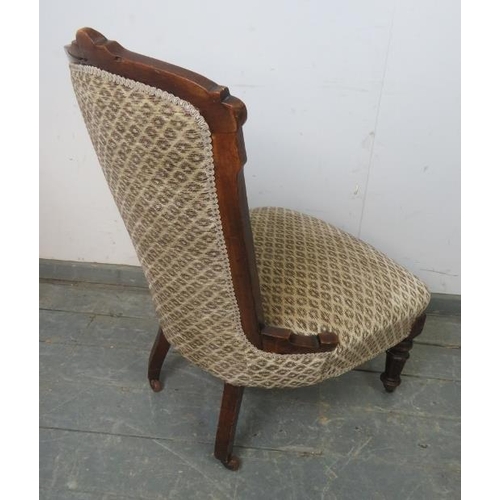 878 - A late Victorian mahogany show-wood bedroom chair, reupholstered in patterned chenille material, on ... 