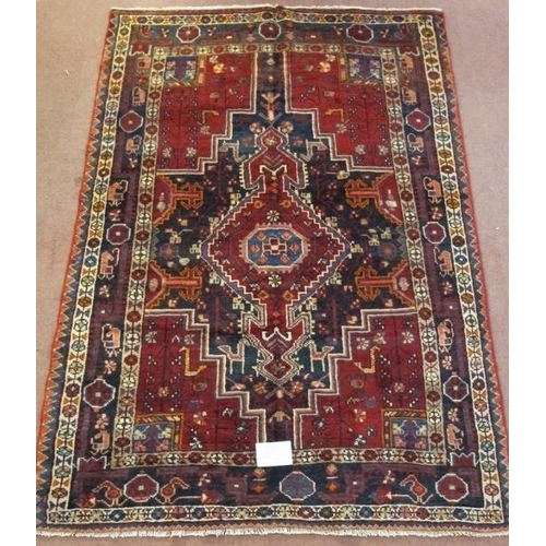 907 - A fine North West Persian Zan Jan rug, central pattern on deep red ground with indigo spandrels. 205... 