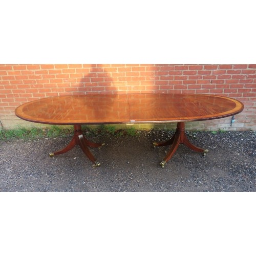 748A - A Regency period and later mahogany twin pedestal dining table of excellent colour, possibly Irish, ... 