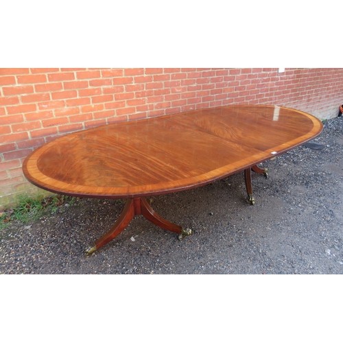 748A - A Regency period and later mahogany twin pedestal dining table of excellent colour, possibly Irish, ... 