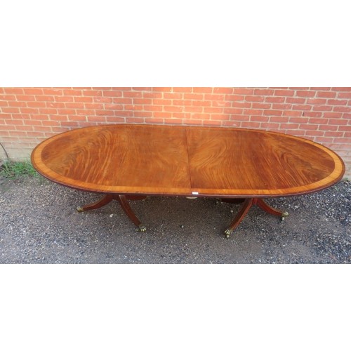 748A - A Regency period and later mahogany twin pedestal dining table of excellent colour, possibly Irish, ... 